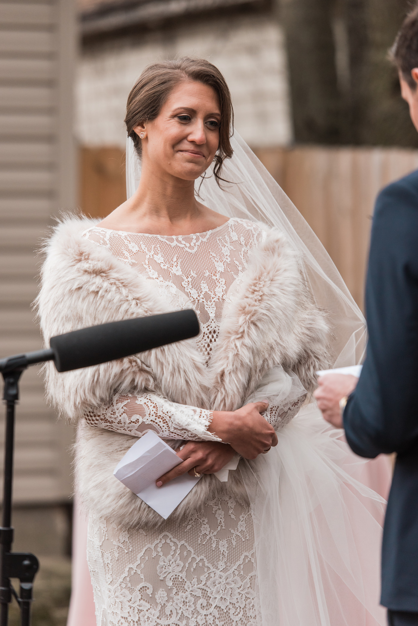 Couple exchanges vows during their outdoor ceremony