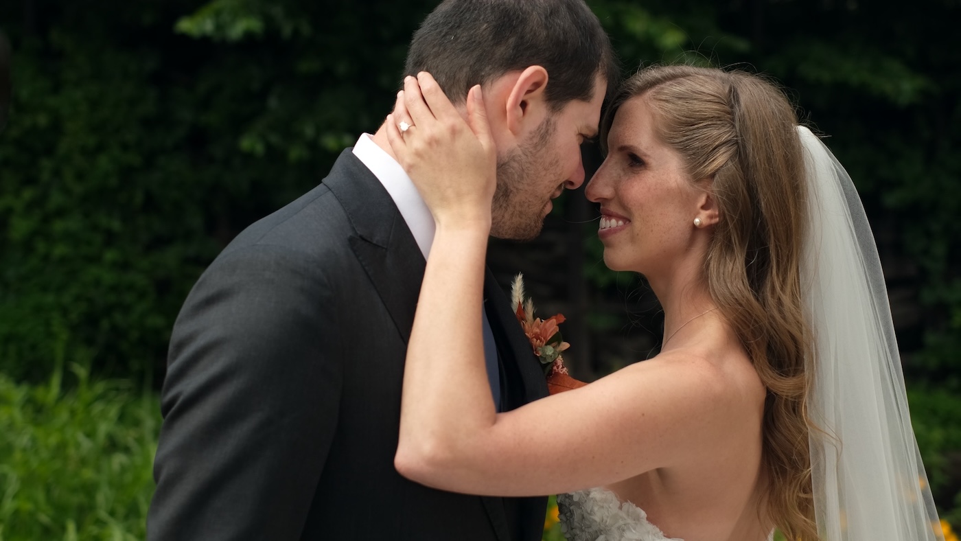 Bride and groom embrace on their wedding day outside of Fairlie in Chicago